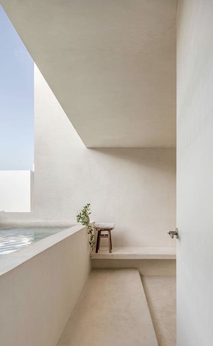 UV-Stable Microcement for Terraces & Balconies in Jeddah Minimalist outdoor terrace in Jeddah featuring seamless white microcement flooring,